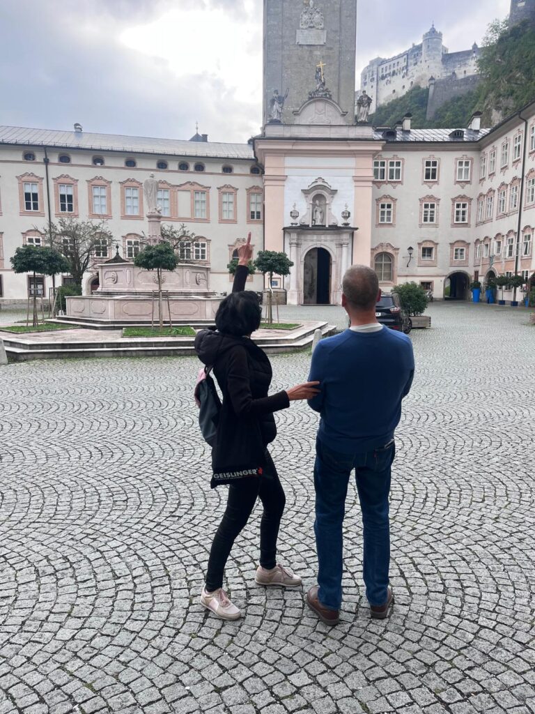 Guide Annabelle Blanc at the Makartsteg love lock bridge, ready to lead your shorter Salzburg walking tour, a premium alternative to a Salzburg self guided walking tour for short time.