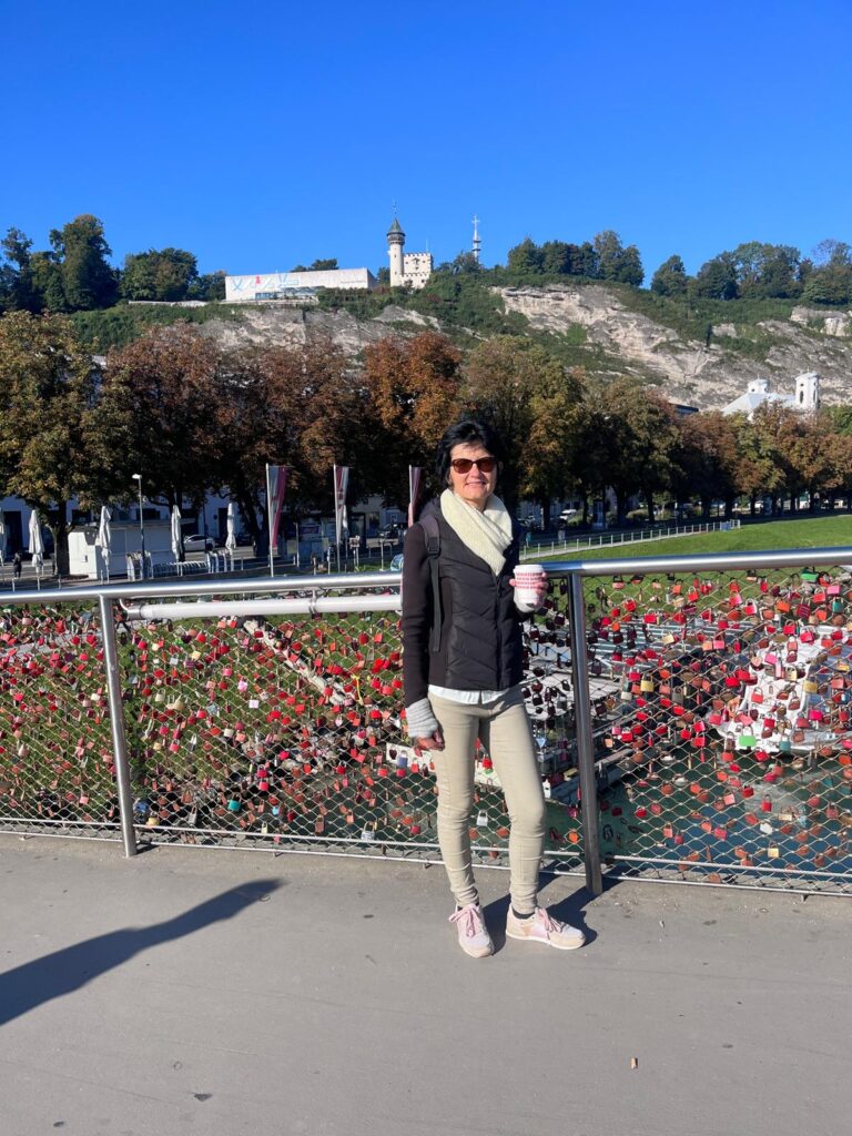 Certified guide Annabelle Blanc pointing out Baroque architectural details in the DomQuartier during a shorter Salzburg walking tour, providing the ideal Salzburg guided walking tour for short time.