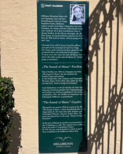 The informational plaque for the iconic Sound of Music Gazebo, a peaceful stop included in our Hellbrunn Palace Tours in Salzburg.